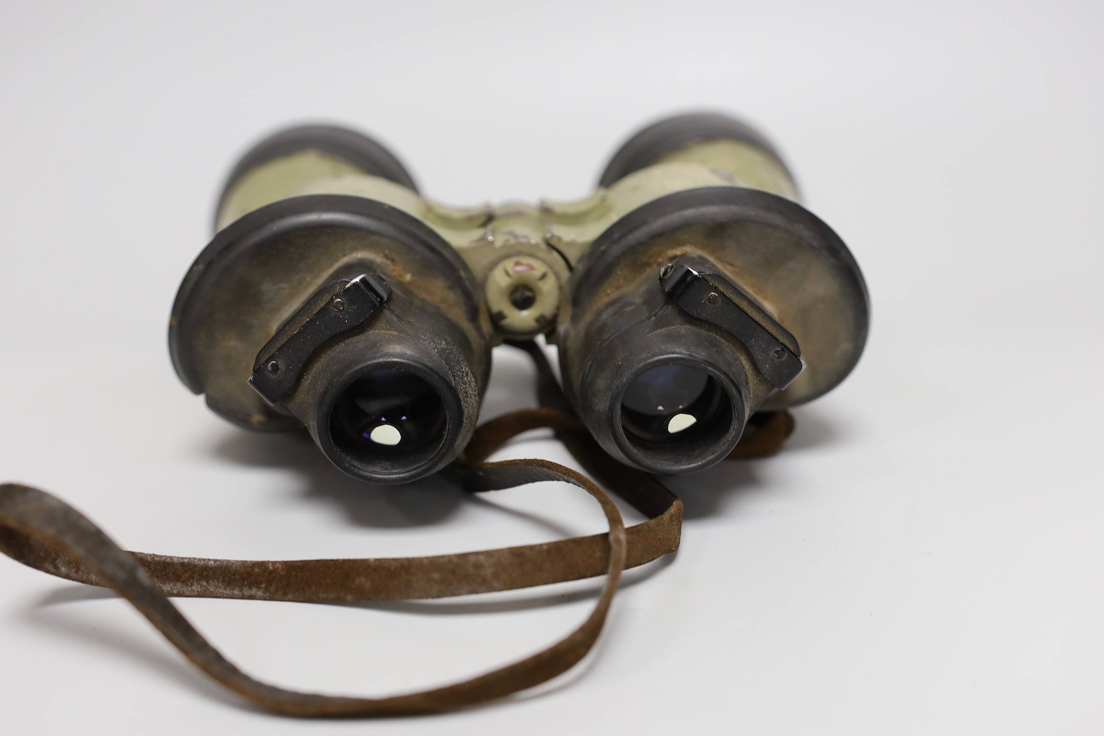 A pair of WWII German U boat binoculars, blc 7 x 50 serial no. 55429, rubber mounts, 19cms long